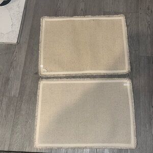 Two Pottery barn place mat.